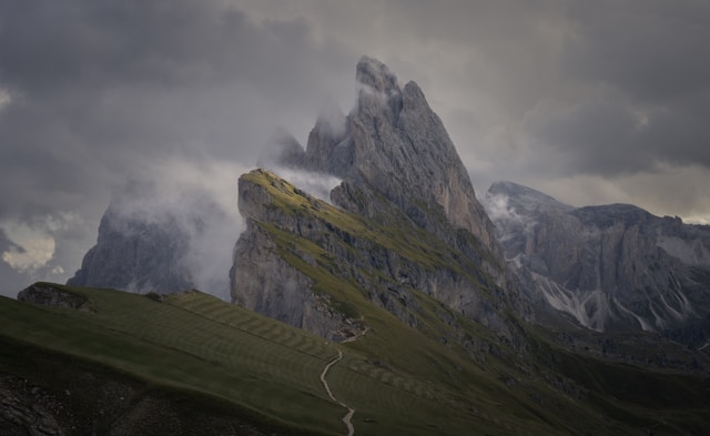 Jagged mountain peaks under a cloudy sky